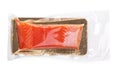 A piece of salmon fillets in a vacuum blister pack isolated on white background