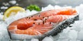 A piece of salmon on ice with lemon Royalty Free Stock Photo