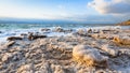 Piece of salt close up on Dead Sea on sunset Royalty Free Stock Photo