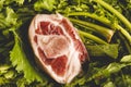 Piece of salted pork shoulder on fresh turnip greens, ingredients of the Galician