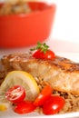 Piece of seared halibut over brown rice Royalty Free Stock Photo