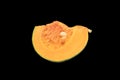 Piece sliced of Japanese pumpkin isolated on black background