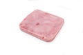 Piece of sliced pork ham isolated over white background Royalty Free Stock Photo