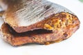 Piece of smoked spiced salmon or trout fish Royalty Free Stock Photo