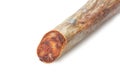 Piece of Spanish chorizo sausage Chorizo iberico on white background. Royalty Free Stock Photo