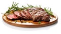 A piece of steak on a cutting board with a sprig of rosemary Royalty Free Stock Photo