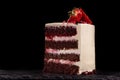 Piece of strawberry cake on a black background. Royalty Free Stock Photo