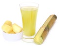 Piece of sugarcane with juice Royalty Free Stock Photo