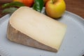 Piece of tasty Ossau-Iraty or Esquirrou sheep cheese produced in south-western France, Northern Basque Country