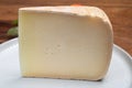 Piece of tasty Ossau-Iraty or Esquirrou sheep cheese produced in south-western France, Northern Basque Country