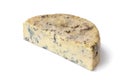 Piece of traditional English Stilton blue cheese close up on white background Royalty Free Stock Photo