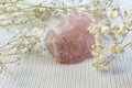 Piece of unpolished rough pink quartz as nice background. Minimal color still life photography Royalty Free Stock Photo