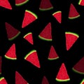 Piece of watermelon on black seamless background. Fresh vitamin nutrition. Summer pattern of tasty food background