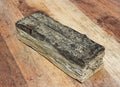 Piece of wood beam decayed by Fibroporia Vaillantii