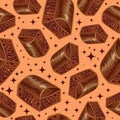 Pieces of aerated chocolate on a beidge background