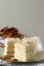 Pieces of apple cake and dried apples on a wooden table. Rustic style. Royalty Free Stock Photo