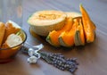 Pieces of baguette and melon on table