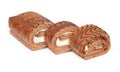 Pieces of baked roll with cream filling Royalty Free Stock Photo