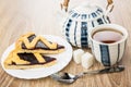 Pieces of bilberry, teapot, cup of tea, lumpy sugar Royalty Free Stock Photo