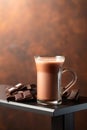 Pieces of bitter chocolate and glass of cocoa drink Royalty Free Stock Photo