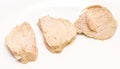 Pieces of boiled chicken breast over white background Royalty Free Stock Photo