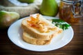 Pieces of bread with sweet home-made fruit jam from pears and apples in a plate Royalty Free Stock Photo