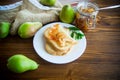 Pieces of bread with sweet home-made fruit jam from pears and apples in a plate Royalty Free Stock Photo