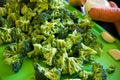 Pieces of broccoli on cutting board