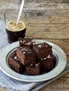 Pieces of cake chocolate brownies on wooden background. Homemade baking. Copy space Royalty Free Stock Photo