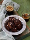 Pieces of cake chocolate brownies on wooden background. Homemade baking. Copy space Royalty Free Stock Photo