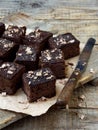 Pieces of cake chocolate brownies on wooden background. Homemade baking. Copy space Royalty Free Stock Photo