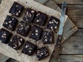 Pieces of cake chocolate brownies on wooden background. selective focus. Royalty Free Stock Photo