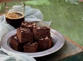 Pieces of cake chocolate brownies on wooden background. selective focus. Royalty Free Stock Photo