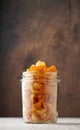 Pieces of candied orange peel coated in sugar in jar Royalty Free Stock Photo