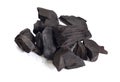 Pieces of charcoal isolated on white background Royalty Free Stock Photo