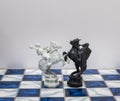 A pieces of chess character on the board with a light. A character represents strategy, planning, brave, betrayal, confrontation a Royalty Free Stock Photo