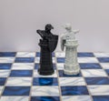 A pieces of chess character on the board with a light. A character represents strategy, planning, brave, betrayal, confrontation a Royalty Free Stock Photo