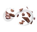 Pieces of chocolate bar with milk splashes, isolated on a white Royalty Free Stock Photo