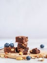 Pieces of chocolate brownie with peanuts Royalty Free Stock Photo