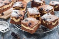 Pieces of chocolate cheesecake brownies with blackberry Royalty Free Stock Photo