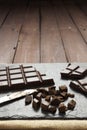 Pieces of chocolate on slate plate with copy space Royalty Free Stock Photo