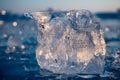 Pieces of clear blue ice of lake Baikal in the winter sunlight Royalty Free Stock Photo