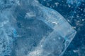 Pieces of clear blue ice of lake Baikal in the winter sunlight. Beauty of nature Royalty Free Stock Photo