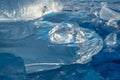 Pieces of clear blue ice of lake Baikal in the winter sunlight. Beauty of nature Royalty Free Stock Photo