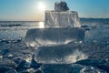 Pieces of clear blue ice of lake Baikal in the winter sunlight. Beauty of nature Royalty Free Stock Photo