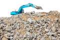 Pieces of concrete and brick rubble debris on construction site with loader Royalty Free Stock Photo