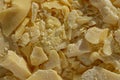 Pieces of crushed cocoa butter. Chopped cocoa oil, natural ingredient in the pharmaceutical and medical industry