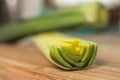 Pieces of cut leek on a wooden board