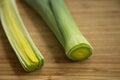 Pieces of cut leek on a wooden board