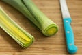 Pieces of cut leek on a wooden board